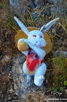 Red-Eyed Rabbit Statue With A Giant Mushroom
