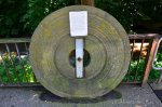old-millstone-with-info-sign
